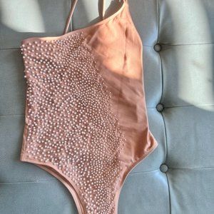Beach Bunny nude colored one shoulder swimsuit with pearl accents